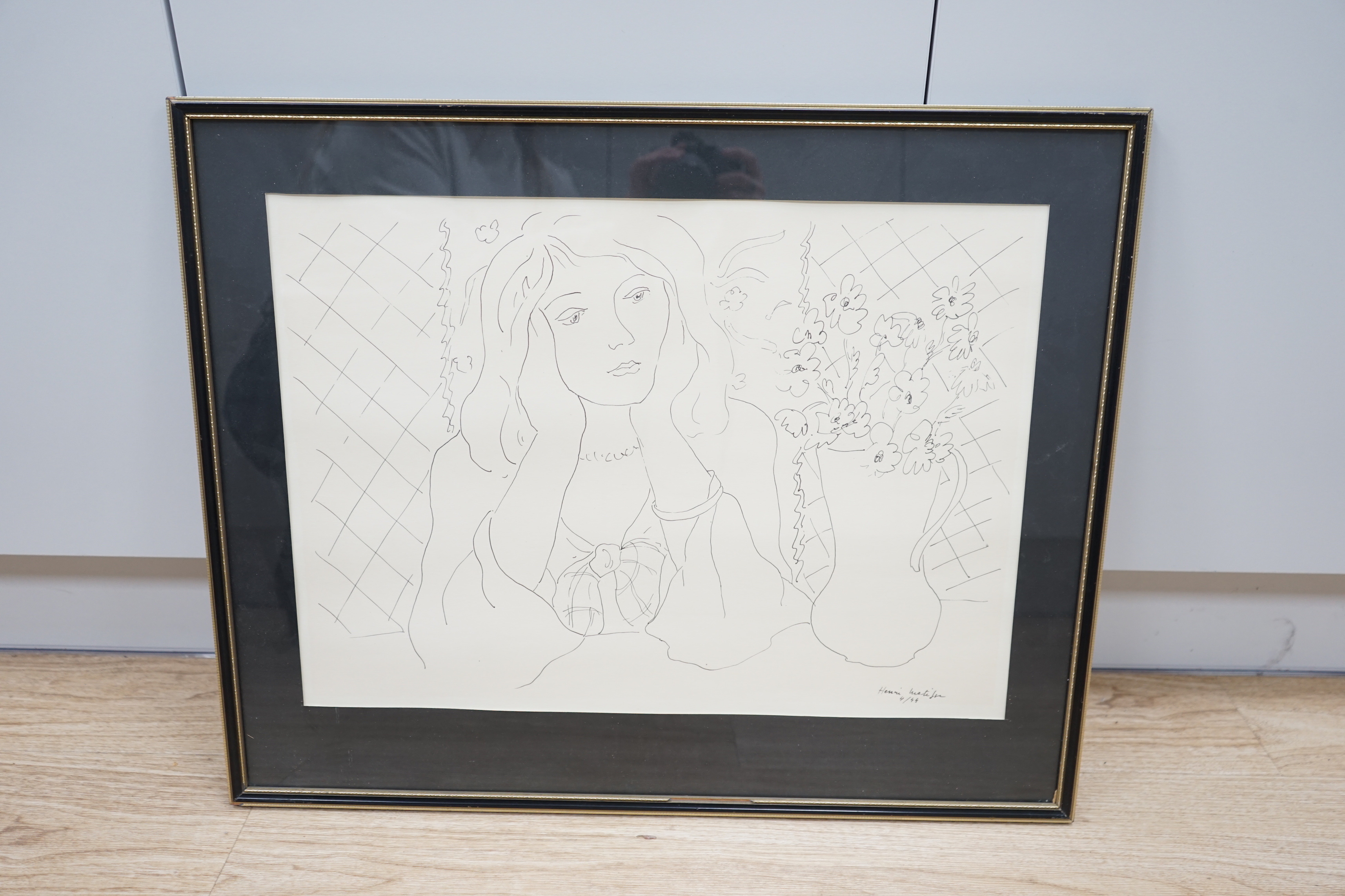 Attributed to Elmyr de Hory after Henri Matisse (1869-1964), pen and ink, lady and vase of flowers, bears signature and dated 4/55, 38 x 53cm